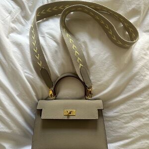 Elegant Beige Handbag with Gold Accents